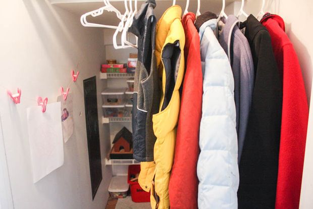 Turn an oversized closet under the stairs into a kids' play space.