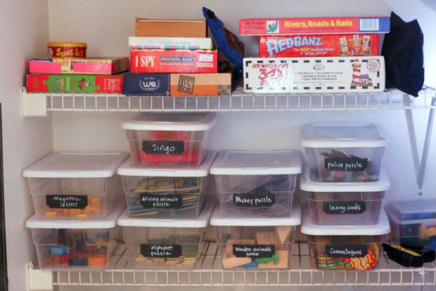 Turn the extra space of a closet under the stairs into toy storage. narnia-shelves
