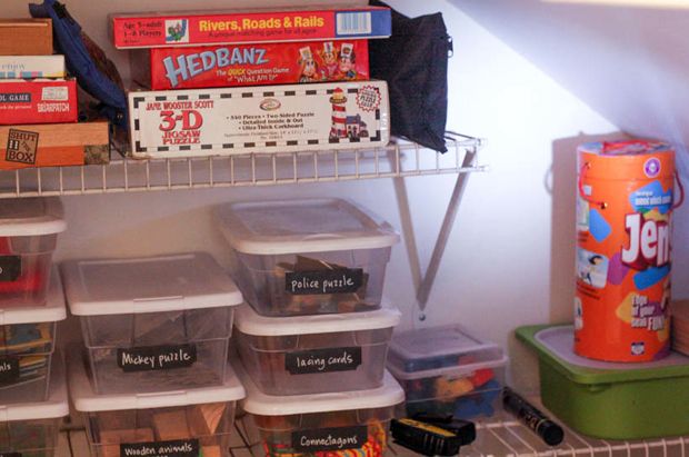 Turn the extra space of a closet under the stairs into toy storage.