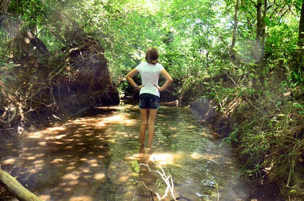 girl-standing-in-creek